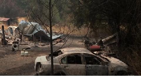 Record-breaking Australia heatwave fuels bushfires, cuts power to thousands