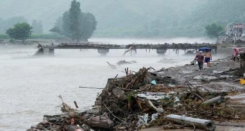 Extreme weather turns Beijing into rain trap, kills at least 30