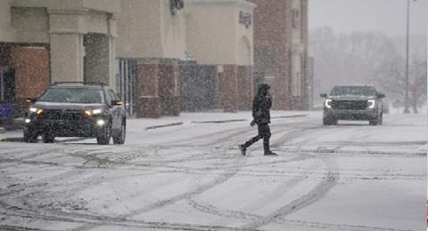 Millions across US face freezing temperatures as south experiences rare snowfall